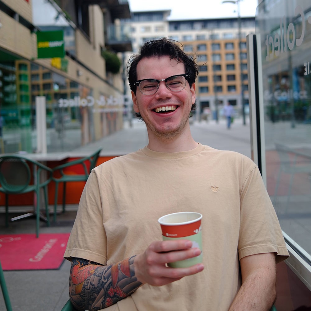 Headshot of Tyler Holmes